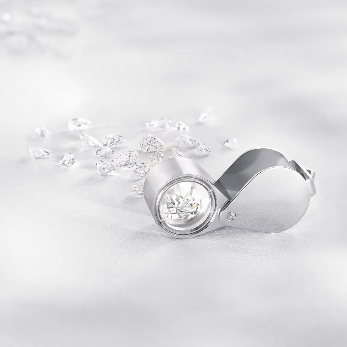 Hand wearing a round brilliant cut diamond ring